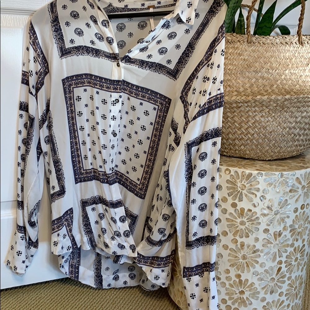 Free people blouse with cross detail